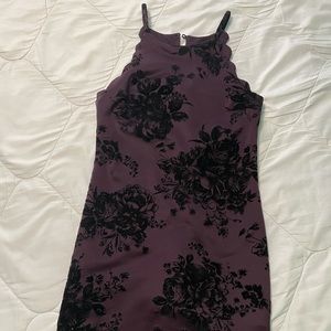 Elegant purple dress with black floral design